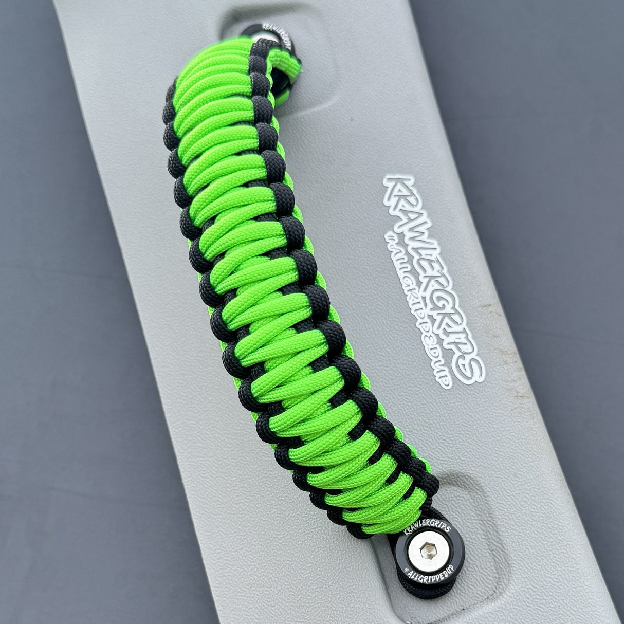 Neon green passenger paracord grab handle