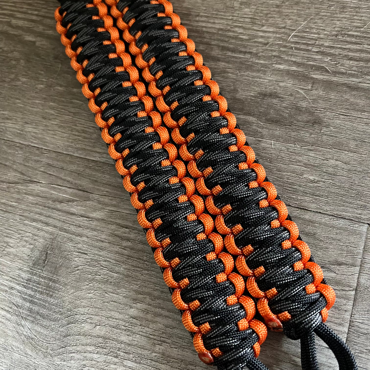 Krawler Grips Orange Touch of Grey Paracord grab handle.