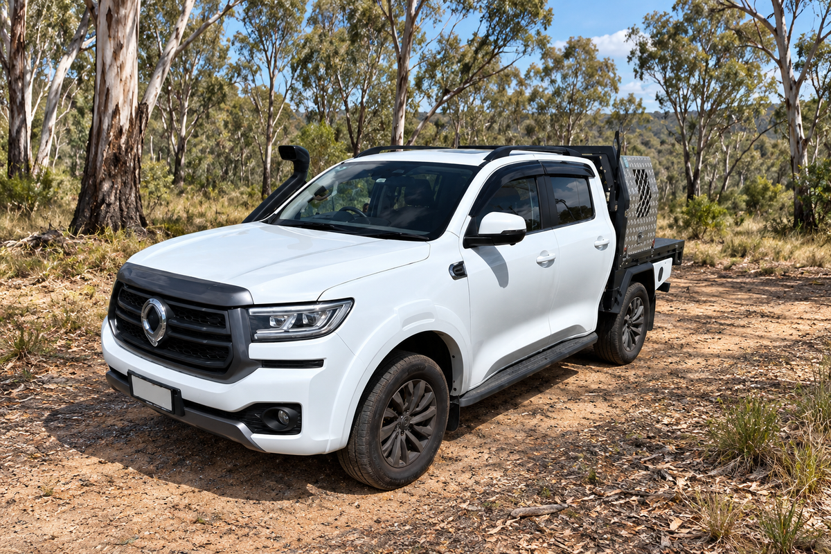 White Krawlergrips ute parked in an Australian bush setting