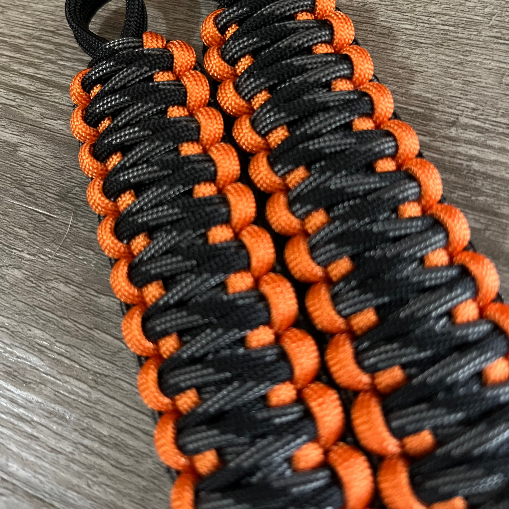 Krawler Grips Orange Touch of Grey Paracord grab handle.